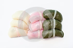 Korean traditional rice cake tteok isolated on white knitted background close-up.