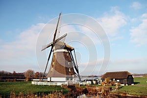 Korenmolen Eendragt Mill near the lock of the Zevenhuizer Verlaat photo