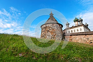 Fortress tower on a high hill photo