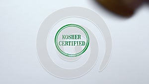 Kosher Certified seal stamped on blank paper background, food quality control