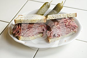 Kosher deli corned beef tongue combination sandwich