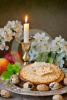 Kosher wine cup, matzah flatbread at passover embracing a jewish pesach attributes