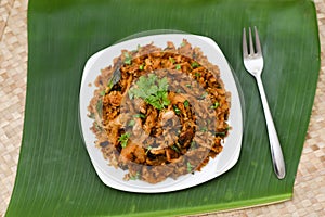 Kothu Parotta a popular South Indian street food in Kerala made with shredded Porotta