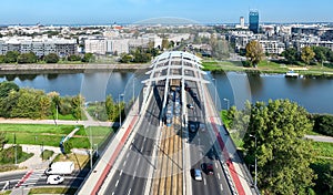 Kotlarski Bridge with two trams in Krakow, Poland