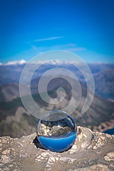 Kotor Bay landscape in a crystal ball