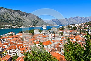 Kotor, Montenegro, Europe. Bay of Kotor on Adriatic Sea. Roofs of the historical buildings in the old town, sea and