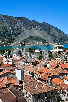 Kotor, Montenegro, Europe. Bay of Kotor on Adriatic Sea. Roofs of the historical buildings in the old town, sea and