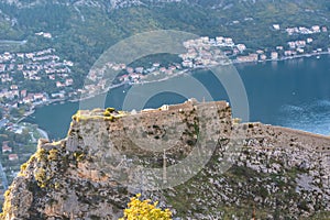 Kotor - Panoramic view of the Kotor Fortress and bay in summer, Adriatic Mediterranean Sea, Montenegro