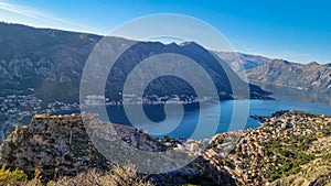 Kotor - Panoramic view of the Kotor Fortress and bay in summer, Adriatic Mediterranean Sea, Montenegro