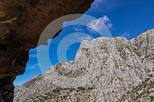 Kotor - Panoramic view on steep Rocky Mountain summit Stirovnik, Lov_en National Park, Dinaric Alps, Montenegro