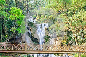 Kouangxi waterfall with wooden bridge at Luang Prabang in Laos