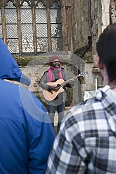 Kouatchou performing in front of Exeter Cathedral