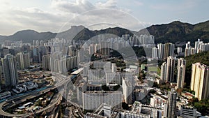 Kowloon cityscape with sunset, with lion rock