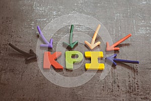 KPI, Key Performance Indicator business target and goal management concept by multiple arrow pointing to colorful alphabet acronym
