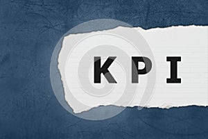 KPI or Key Performance indicator with white paper tears