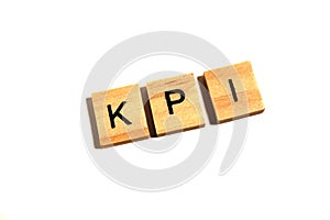 KPI text wooden blocks KEY, Performance and Indicator word isolated on white background.