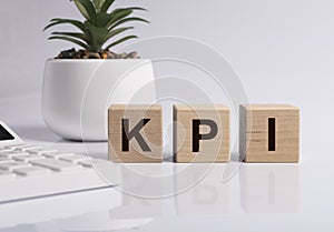 KPI word on cubes. Key performance indicator