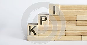 KPI Word Written In Wooden Blocks,Key Performance Indicator