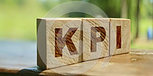 KPI Word Written In Wooden Blocks,Key Performance Indicator. Business concept