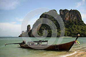 Krabi coastline longtail boat thailand