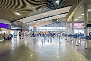 KRABI, THAILAND - FEBRUARY 19, 2018: Indoor view of unidentified people walking inside of the airport of the Krabi