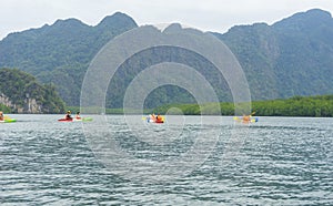 Group of tourists kayaking at Ao tha lane, Krabi