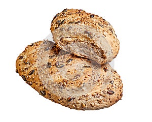 Kraft bread of an elongated shape made of whole wheat flour, sprinkled with various seeds