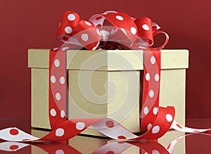 Kraft gift box with red polka dot ribbon