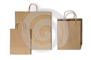 Kraft paper shopping bag mockup isolated on white background.