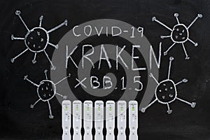 Kraken, new variant of covid 19, written on a blackboard photo