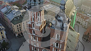 Krakow poland Bazylika Mariacka. St. Mary`s Church town Square Aerial view early in the morning