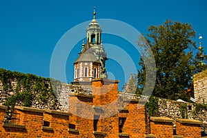 KRAKOW, POLAND: Beautiful landscape with the famous old complex of Wawel Royal Castle on a Sunny summer day in Krakow, Poland