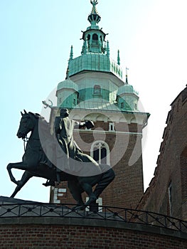 Sculpture and cathedral spire photo