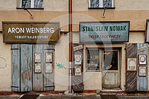 Krakow,Poland-December,2021.Shops with vintage signs in Jewish quarter of Kazimierz,Szeroka street.Store facade,trade shops with