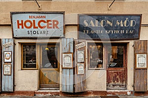 Krakow,Poland-December,2021.Shops with vintage signs in Jewish quarter of Kazimierz,Szeroka street.Store facade,trade shops with