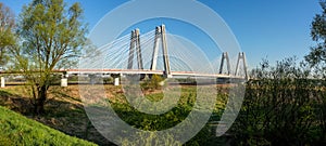 Krakow, Poland.  Double cable-stayed bridge over the Vistula river at sunrise