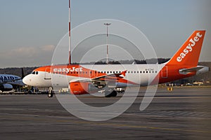 Krakow, Poland 20.12.2019: easyJet Airbus A319 is at the airport, preparing for flight. The service of the vessel flying before