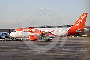 Krakow, Poland 20.12.2019: easyJet Airbus A319 is at the airport, preparing for flight. The service of the vessel flying before