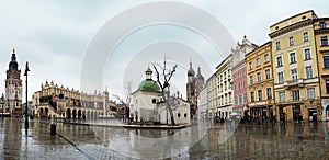 Krakow, Poland - February 23, 2016: Center of old Krakow in rainy evening, Krakow, Poland