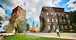 KRAKOW, POLAND - May 10, 2019: View on the inner courtyard of Wawel castle with Thieves tower during the sunny morning in Krakow