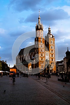 Krakow, Poland. October 9 2019.Old city center view with Adam Mickiewicz monument and St. Mary`s Basilica in Krakow