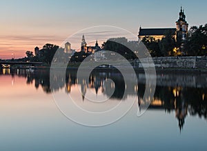 Krakow's Pauline church and Wawel cathedral at night photo