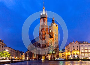 Krakow. St. Mary`s Church and market square at dawn.