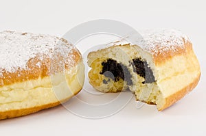 krapfen or donuts with poppy