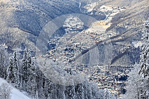 Krasnaya Polyana village snowy winter mountain landscape. Sochi, Russia, West Caucasus