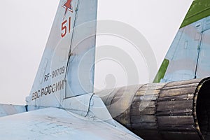 Krasnodar, Russia - February 23, 2017: The rear part of the Su-35 fighter. Steering flaps. A nozzle of a jet engine of an amber wi