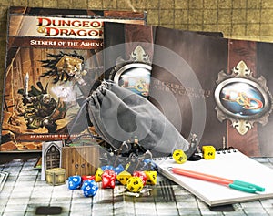 Playing Dungeons and Dragons fantasy role play game. Dices, cards photo