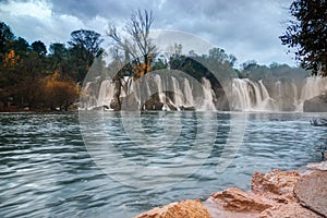 Kravica waterfall on the TrebiÅ¾at River, in the karstic heartland of Herzegovina in Bosnia and Herzegovina.