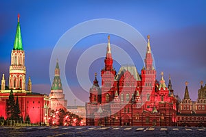 Kremlin and church at dramatic dawn in Red square of Moscow, Russia