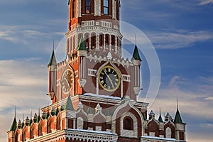 Kremlin clock tower in the rays of the setting sun